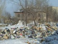 Свалка мусора в центре жилого микрорайона.