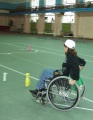 Соревнования по слайдингу среди инвалидов с поражением опорно-двигательного аппарата. Легкоатлетический манеже ФСК  "Саратов". На дистанции.