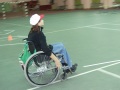 Соревнования по слайдингу среди инвалидов с поражением опорно-двигательного аппарата. Легкоатлетический манеже ФСК  "Саратов". На дистанции.