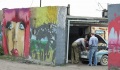 Забор по Ново-Астраханскому шоссе, разрисованный Участниками конкурса граффити "Мы любим наш город".  