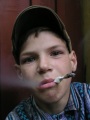 Курящий подросток.