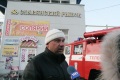 Пожар в здании "Славянского рынка".  Депутат гордумы Олег Комаров дает интервью журналистам.