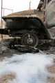 Последствия пожара на автостоянке, который произошел после столкновения бензовоза "Скания" с осветительной опорой.Саратов.